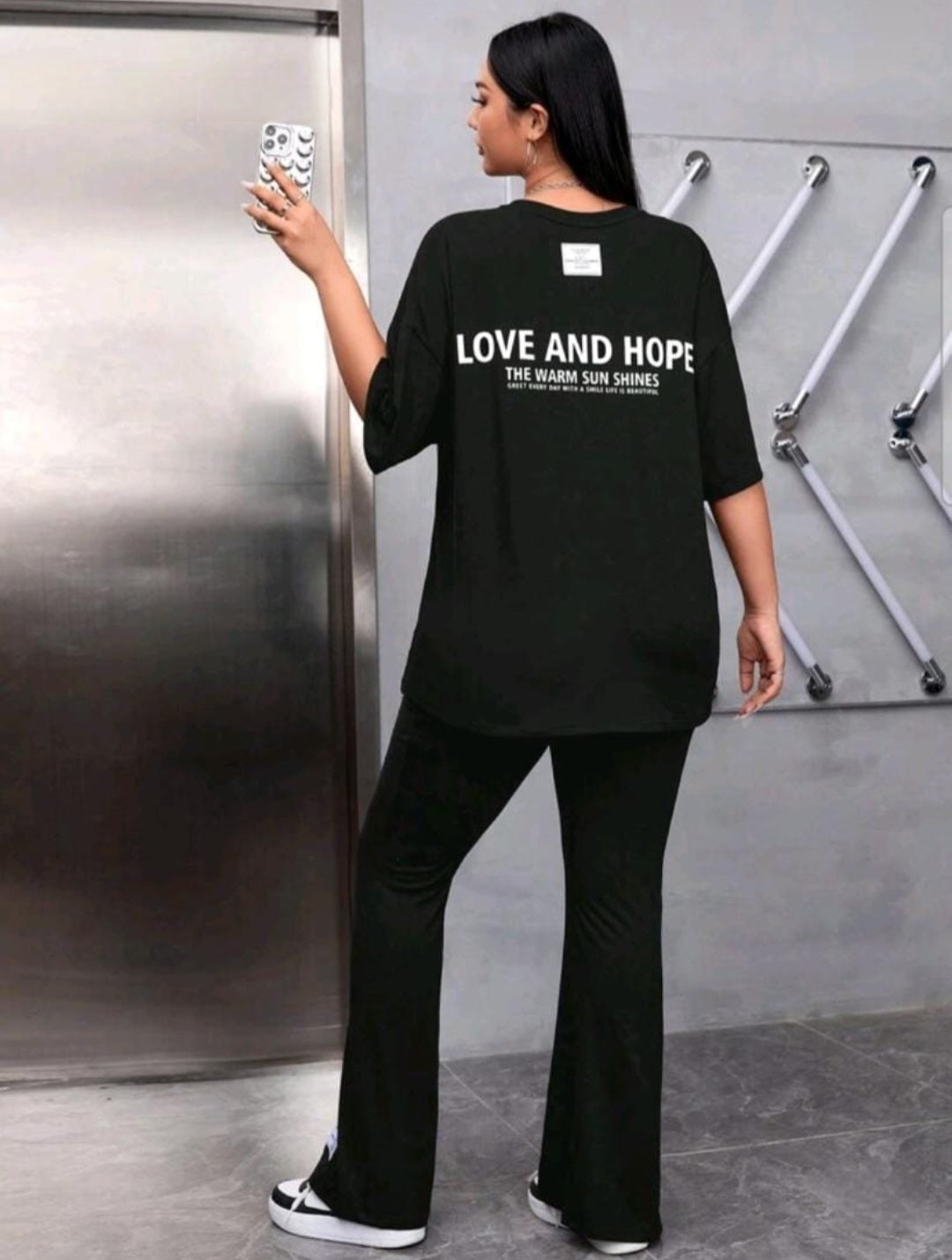 Slogan Graphic Drop
Shoulder Tee & Flare Leg Pants
